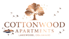 Elegant Cottonwood Apartments logo featuring a stylized tree and dandelions in Lakewood, Colorado.