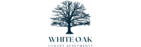 Elegant tree silhouette logo for White Oak Luxury Apartments.