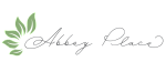 Elegant Abbey Place logo with artistic green leaf design, representing a modern and tranquil environment.