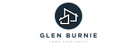 Logo of Glen Burnie Town Apartments featuring stylized overlapping rooftops in a circle.