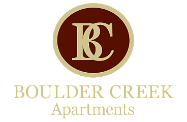 Elegant Boulder Creek Apartments logo featuring a sophisticated gold and maroon design.