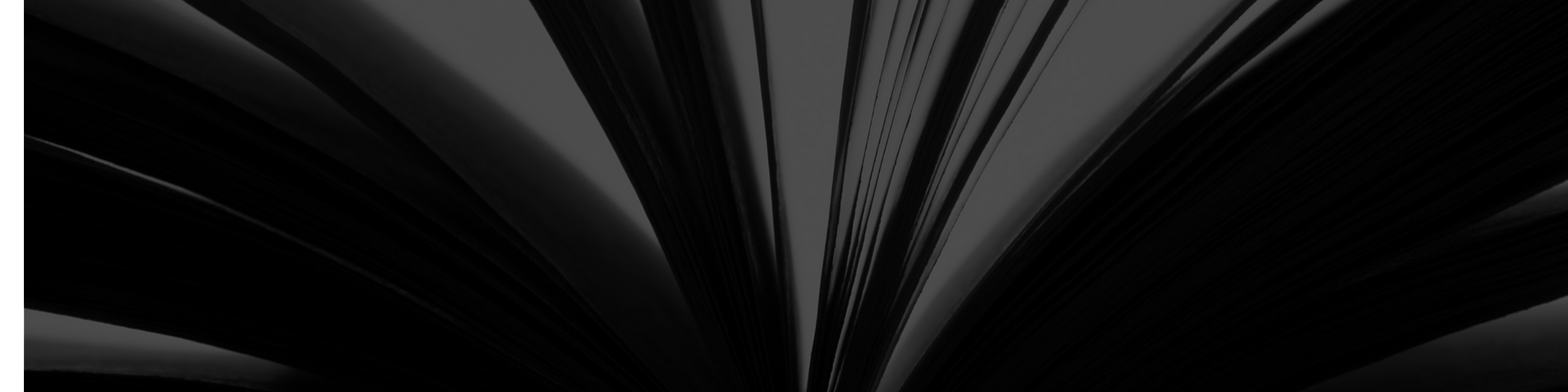 Abstract black and gray design with elegant, flowing lines and dynamic curves, creating a sense of motion and sophistication.