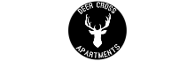Sleek Deer Cross Apartments logo featuring a minimalist deer head design, embodying elegance and modern living.