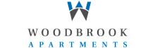 Elegant logo of Woodbrook Apartments featuring a stylish blue and gray design symbolizing modern luxury living.