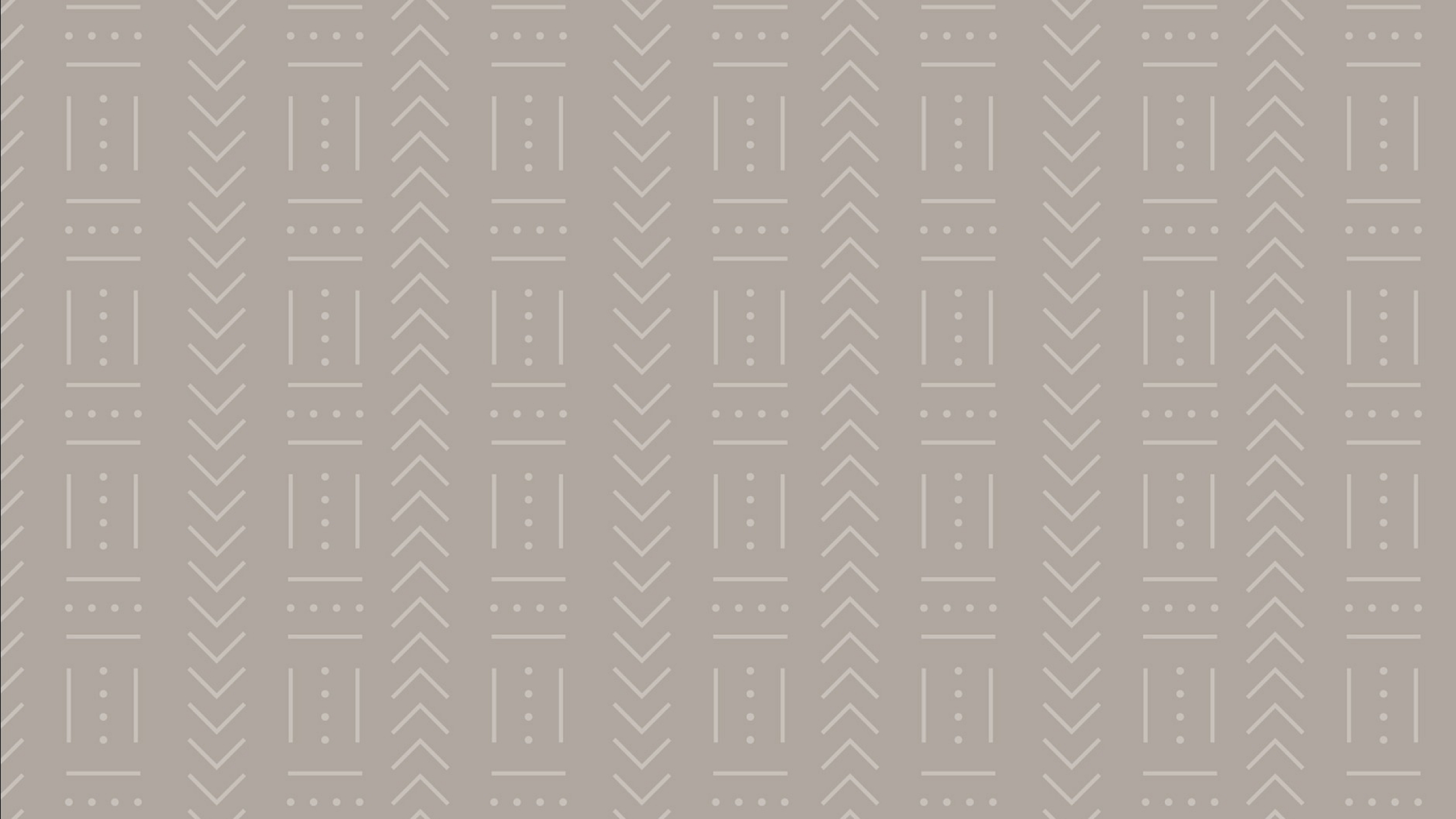 Elegant geometric wallpaper with a chic pattern of arrows and dots in neutral tones.