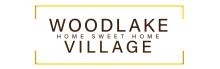 Elegant Woodlake Village logo featuring bold typography, promising a warm welcome home.
