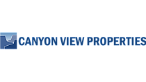 Canyon View Properties logo in bold blue font with a stylized mountain graphic, symbolizing quality real estate.