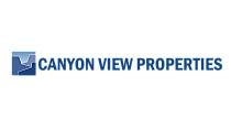 Canyon View Properties logo in bold blue font with a stylized mountain graphic, symbolizing quality real estate.