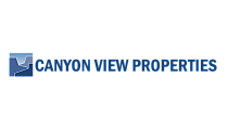 Logo for Canyon View Properties in bold blue lettering with a stylized canyon graphic.