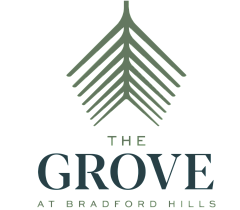 Modern logo for The Grove at Bradford Hills featuring a stylish leaf design.