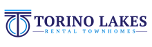 Elegant Torino Lakes Rental Townhomes logo in white, featuring sleek typography and geometric design elements.