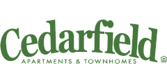 Cedarfield Apartments & Townhomes green logo, showcasing distinctive and elegant housing branding.