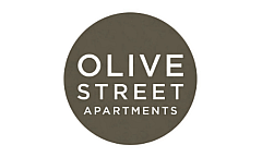 Olive Street Apartments logo in a sleek circular design with modern typography.