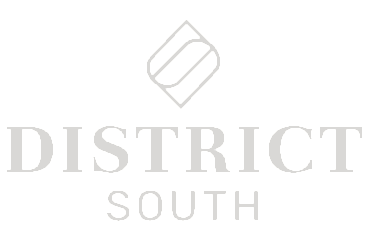 Elegant District South logo featuring a modern geometric design with bold typography, conveying sophistication and style.