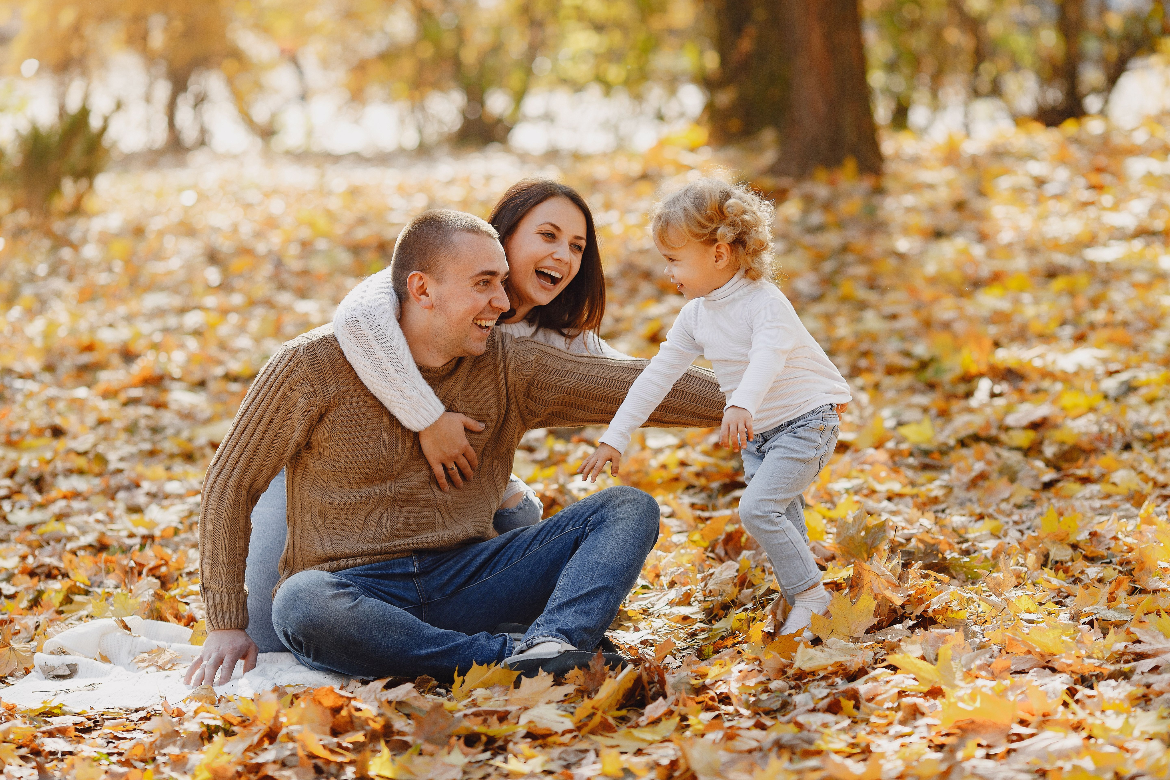 happy-family-having-fun-in-autumn-park-4173132