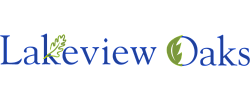 Elegant Lakeview Oaks logo with blue text and green leaf accents, symbolizing nature and tranquility.