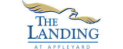 Elegant logo of The Landing at Appleyard featuring a stylized bird in gold, embodying sophistication and style.