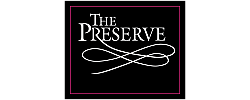 Elegant logo for The Preserve featuring sophisticated white script on a black background, framed with a subtle purple border.