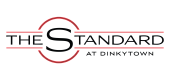 Modern logo for The Standard at Dinkytown featuring sleek typography with a bold letter S and circular design element.