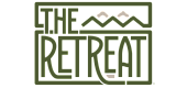 Elegant logo design for 'The Retreat' featuring stylized green text and abstract mountain elements.