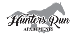 Elegant logo of Hunters Run Apartments featuring a silhouetted horse, symbolizing a blend of luxury and freedom in apartment living.