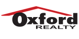 Oxford Realty logo featuring a bold red roof design over a sleek black text.