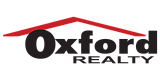 Oxford Realty logo with a stylized red roof design over the brand name, emphasizing trust and professionalism in real estate.