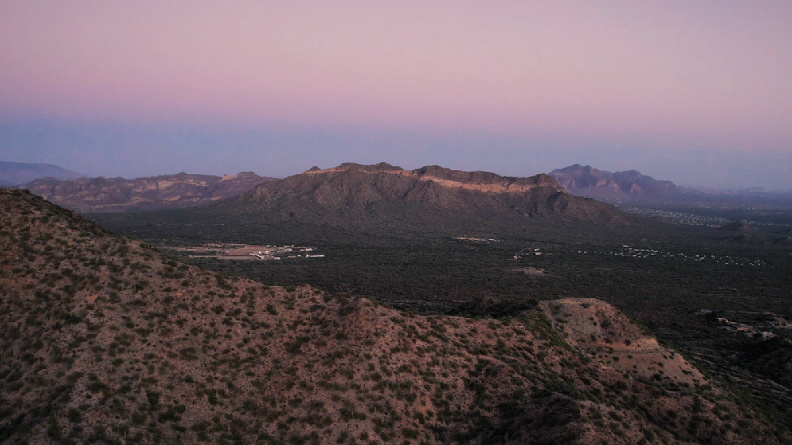 view of mountain ranges in phoenix az at sunset