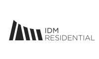 Modern IDM Residential logo featuring sleek architectural lines and bold typography.