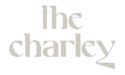 Elegant logo design for The Charley with sophisticated typography.