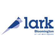 Bold and modern logo of Lark Bloomington at Latimer Square featuring a stylized bird design.
