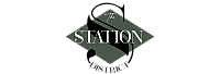 Elegant logo design reading 'The Station' with a modern geometric background.