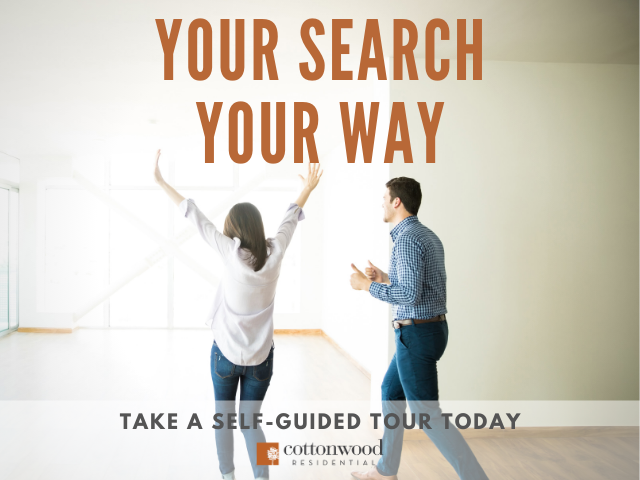 Image of couple taking a self-guided tour of a vacant apartment