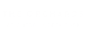 Logo for The Orchards at Cherry Creek Park, showcasing a modern and inviting community design.