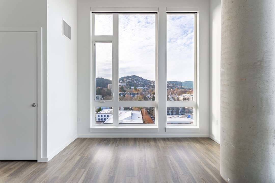 Modera Akoya oversized window living room image