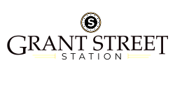 Elegant Grant Street logo featuring a circular emblem with a bold 'S' and sophisticated typography.