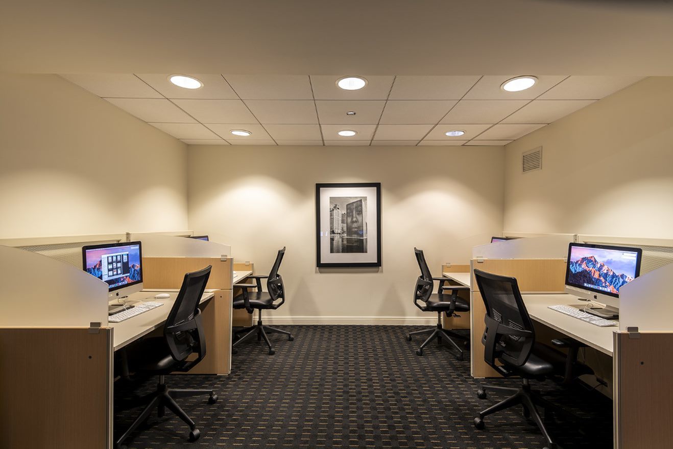 Residents Relaxing in Club Room | Chicago IL Apartment For Rent | The Streeter