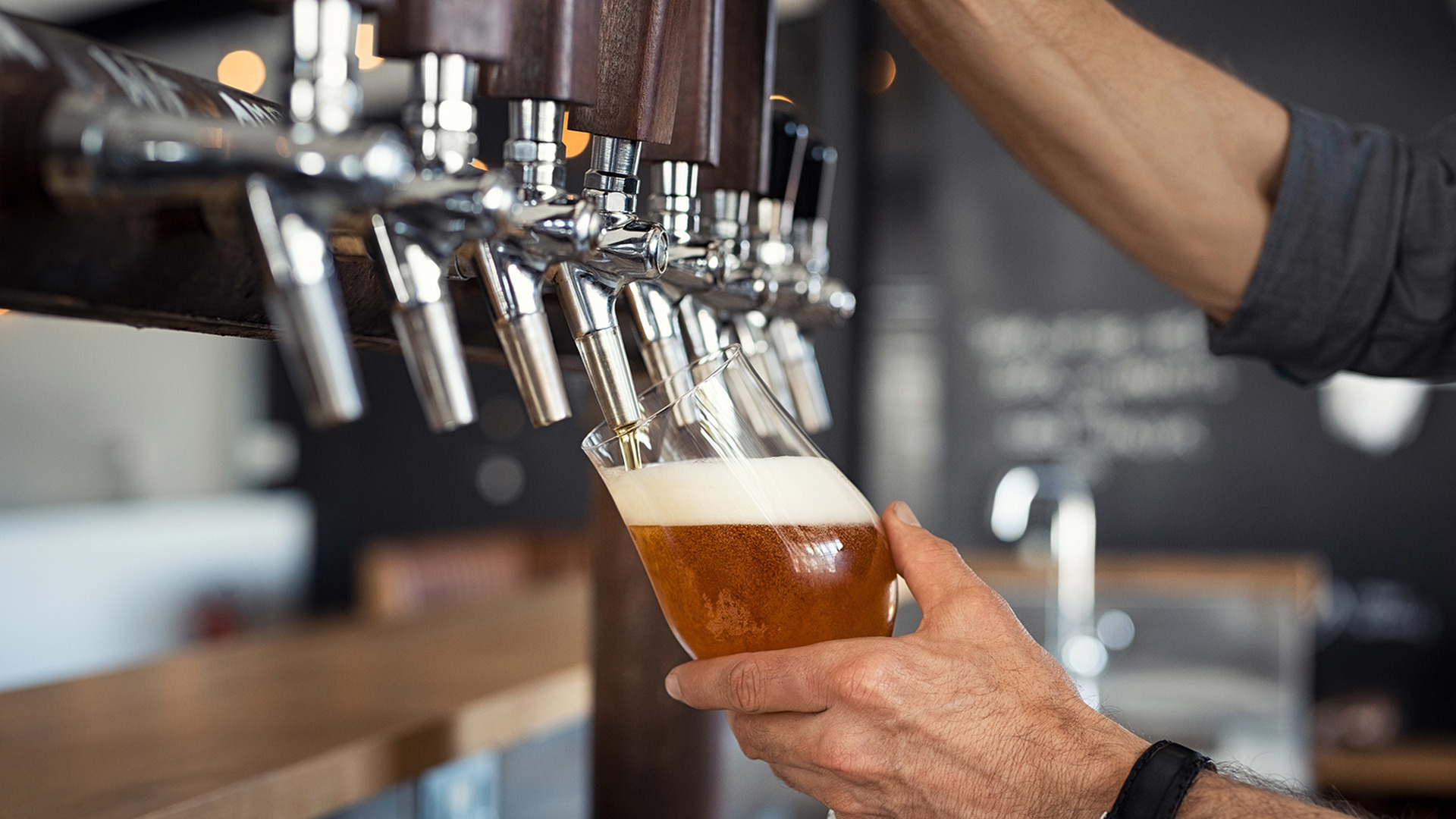 pouring a beer from the tap