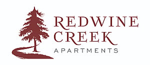 Elegant Redwine Creek Apartments logo featuring a stylized red tree and winding path, symbolizing natural beauty and serenity.
