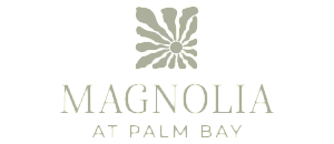 Elegant Magnolia at Palm Bay logo featuring a stylized floral emblem.