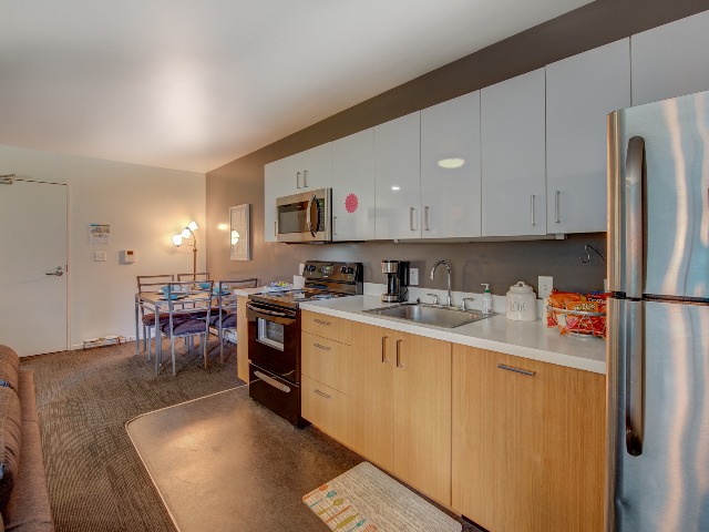Skybox Apartments Furnished Apartment Kitchen And Dining Room
