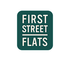 Modern and inviting logo of First Street Flats, featuring bold typography on a deep teal background.