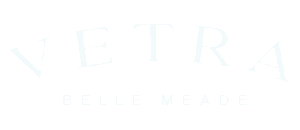 Elegant Vetra Belle Meade logo on a sleek black background, showcasing luxury and sophistication.