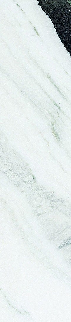Elegant marble surface with flowing grey and black veins, ideal for luxurious interiors.