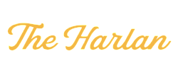 Elegant logo design featuring 'The Harlan' in stylish gold script against a sleek black background.