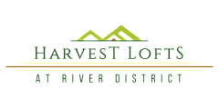 Modern logo for Harvest Lofts at River District, featuring stylized green mountains and elegant typography.