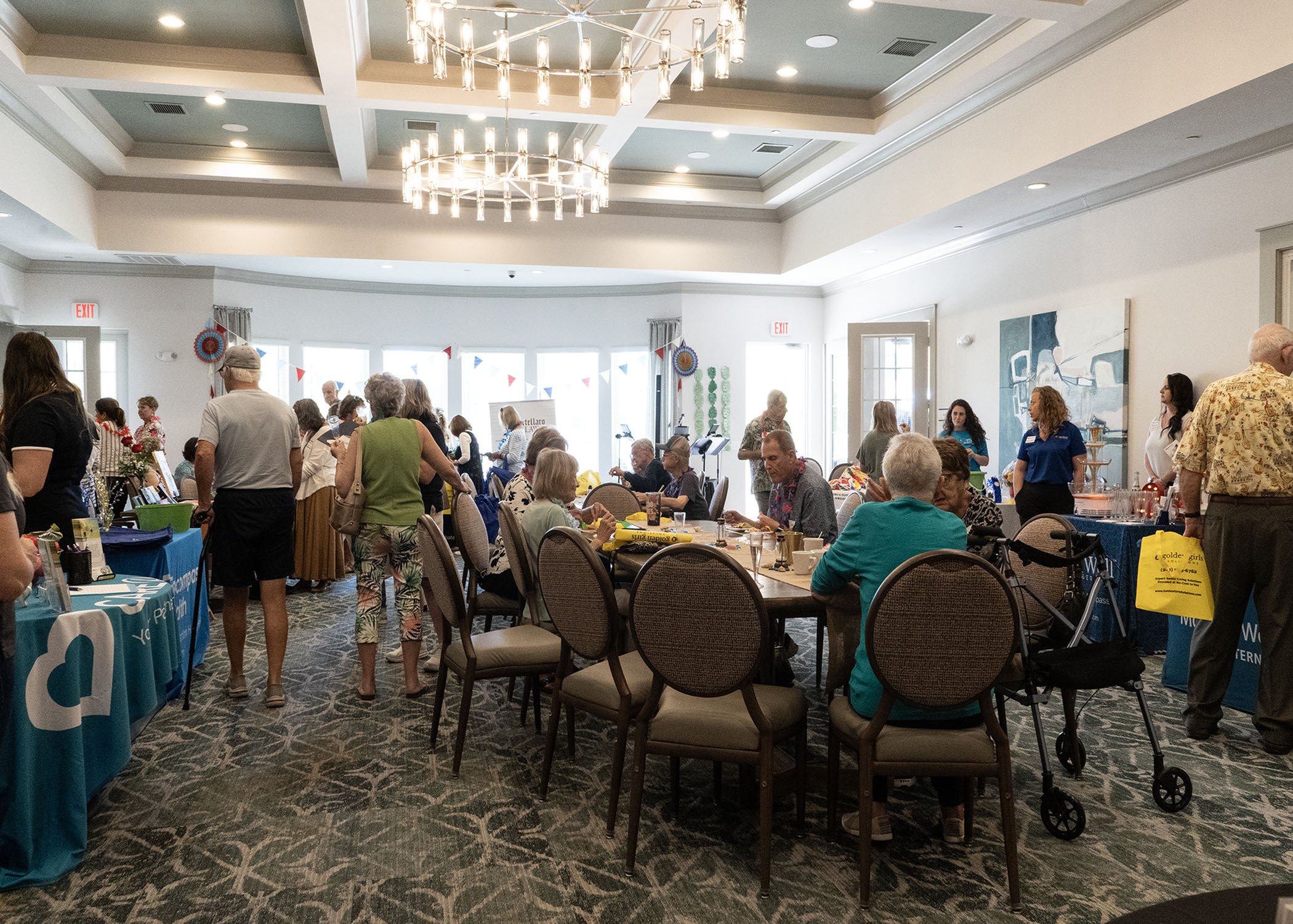 A gathering held in the clubhouse at the Alloro at University Groves