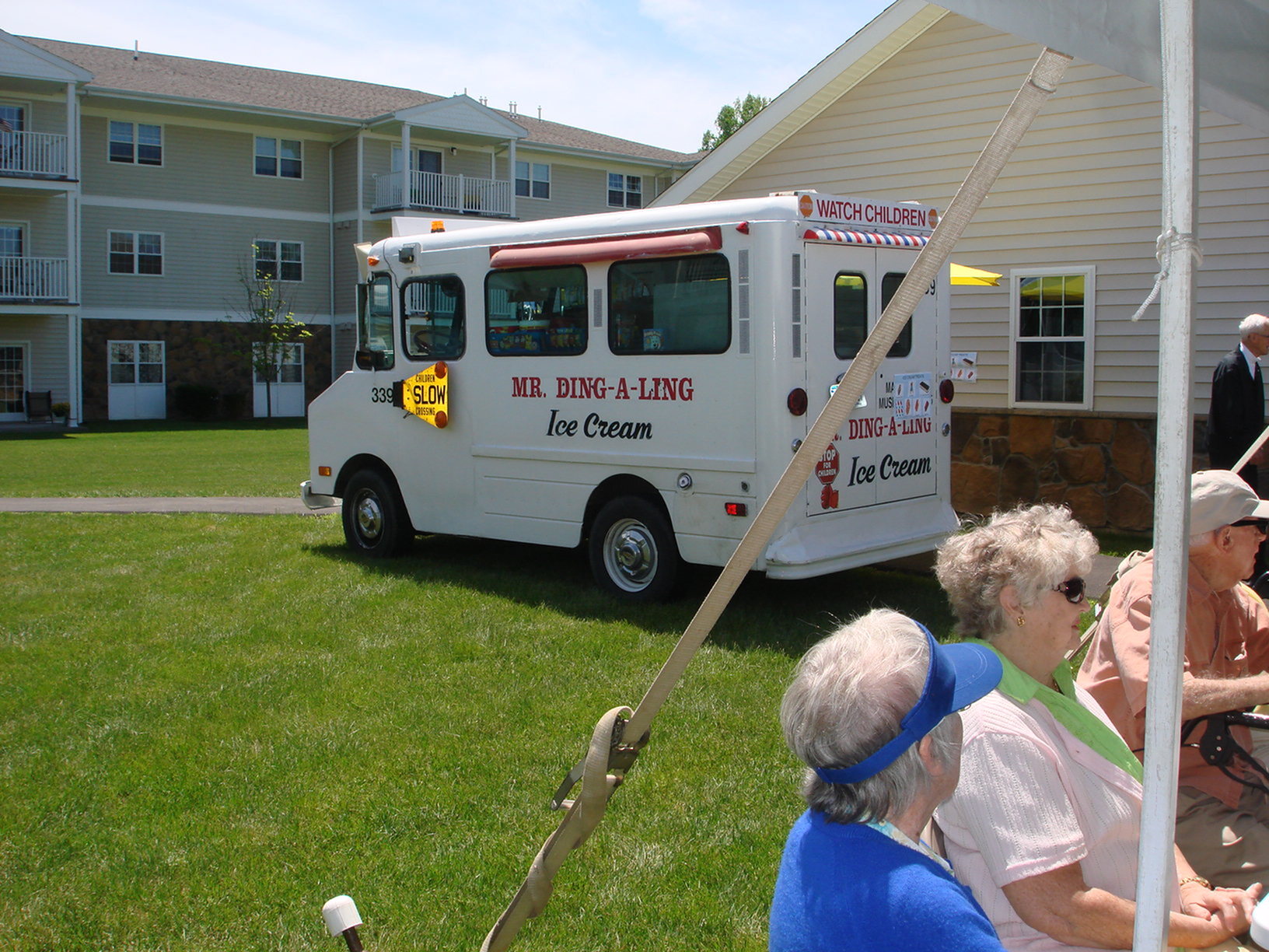 A group of residents enjoying ice cream truck treats
