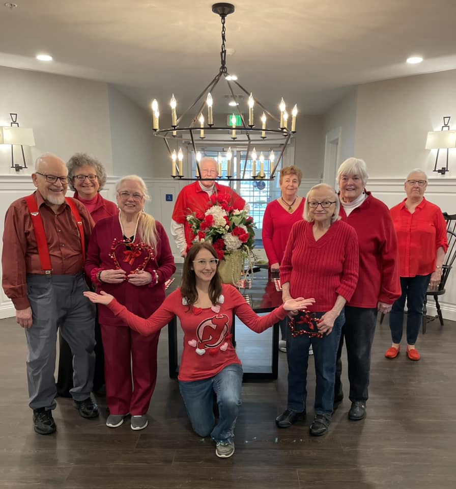 Residents gathered together in Pinnacle's lobby, posing for the camera