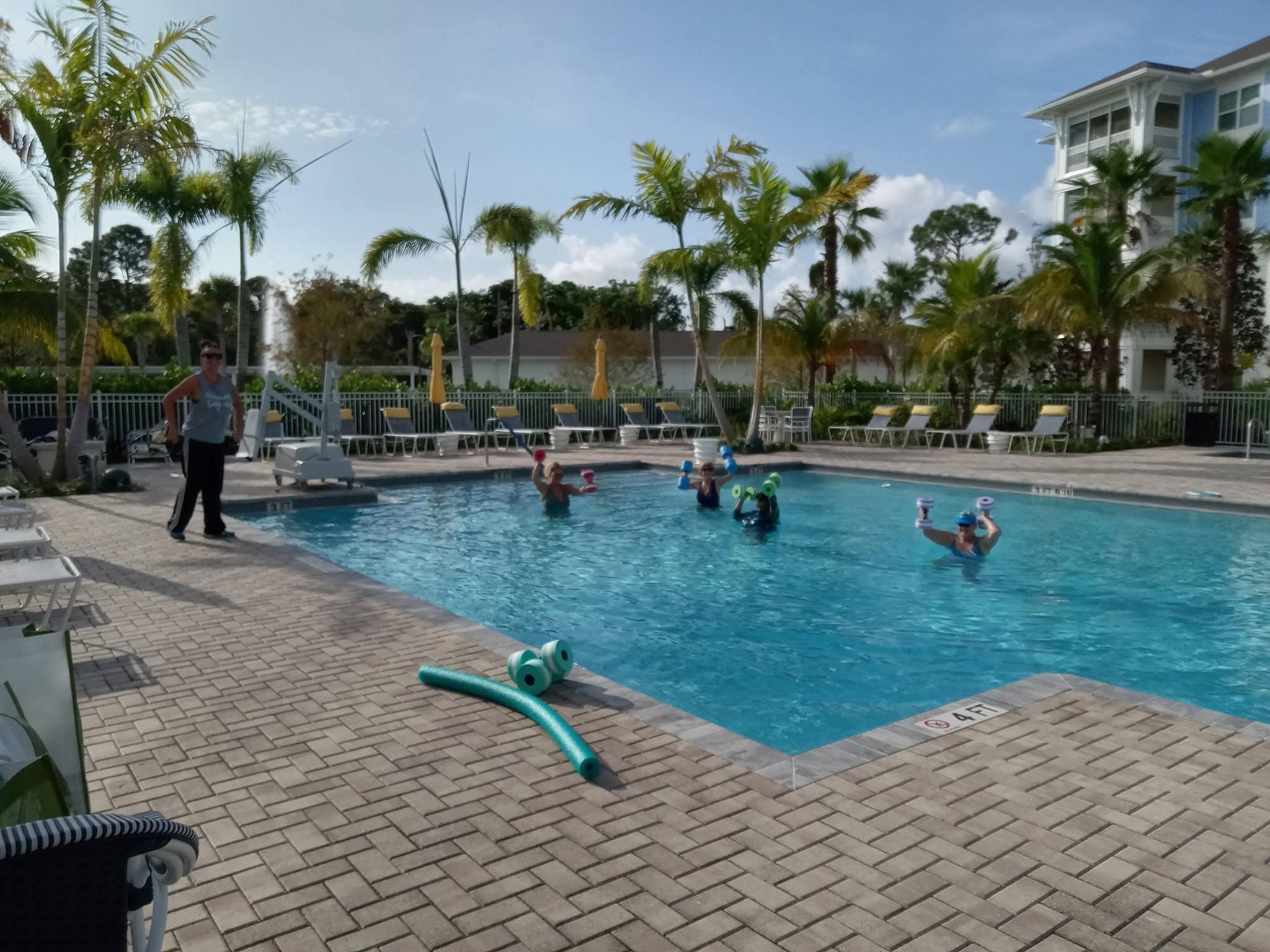 Sovana residents having fun playing in the outdoor pool